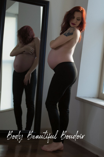Pregnant Redhead in mirror